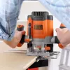 Frezeris/Trimeris Black & Decker KW1200EKA-QS – kompaktiškas frezeris su reguliuojamu gyliu, ergonomiškas dizainas