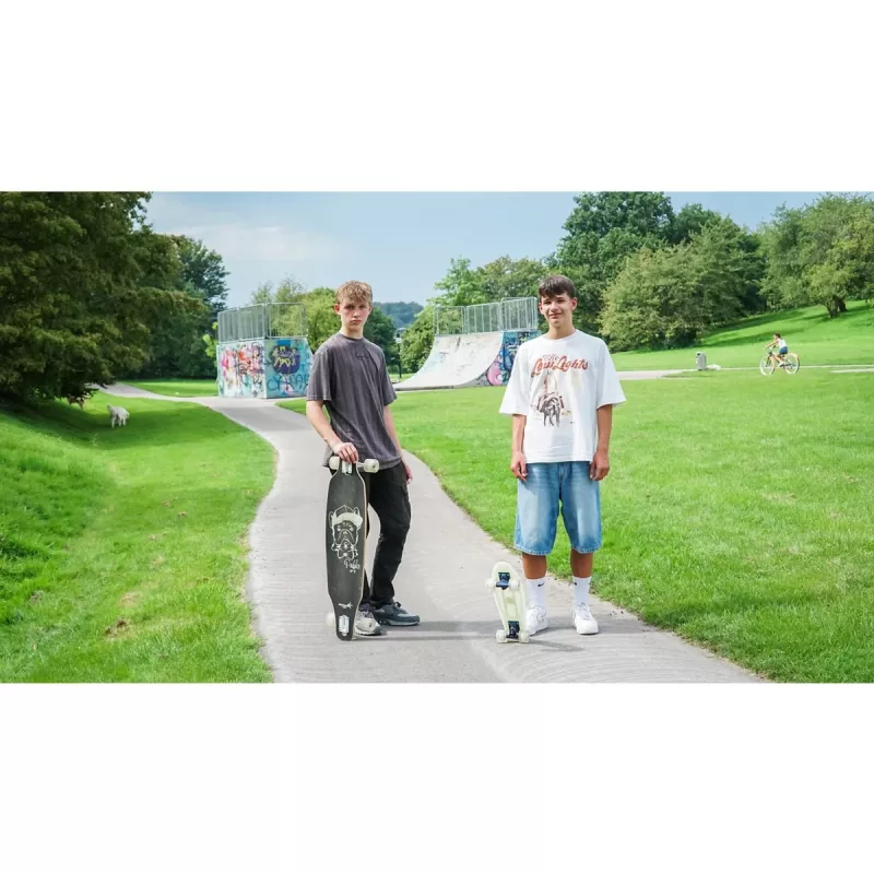 Longboard Muuwmi Lights GLOW ABEC 7 su šviečiančiais ratais, juoda/žalia
