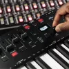 M-Audio Oxygen Pro 49 MIDI klaviatūros valdiklis – 49 klavišai, 16 padų, 9 faderiai, OLED ekranas, USB, MIDI išėjimas
