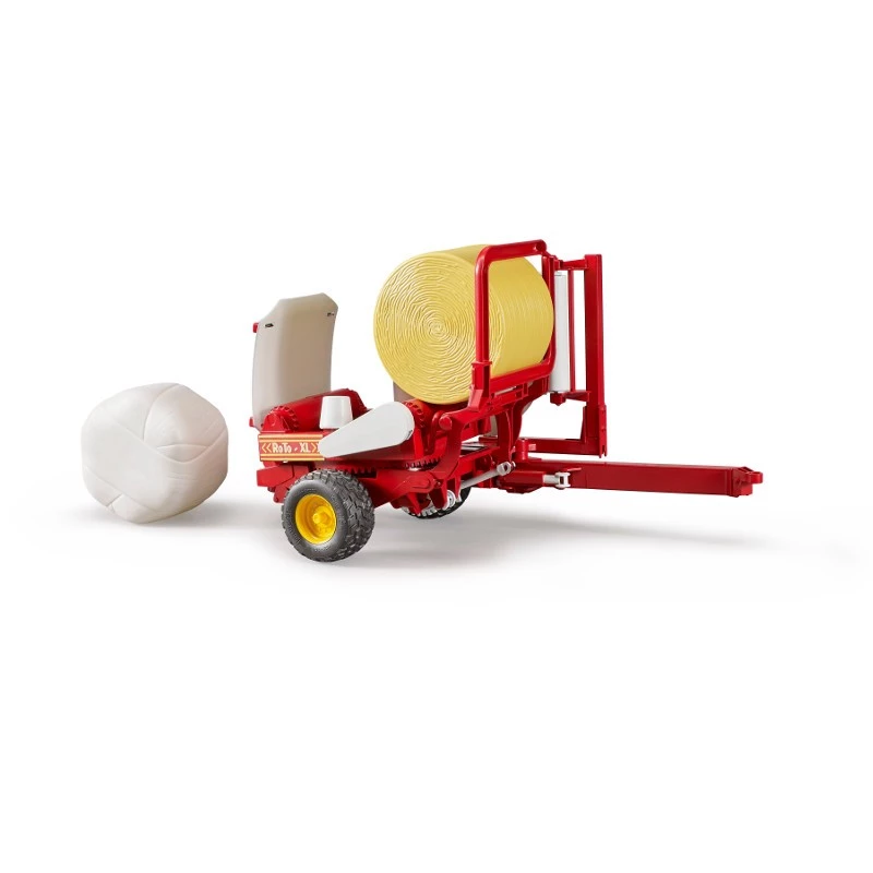 Žaislinis traktorius su priekaba ir šieno ritiniais BRUDER 02122