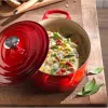 Le Creuset Signature ovalus troškintuvas 27 cm vulkaninė spalva
