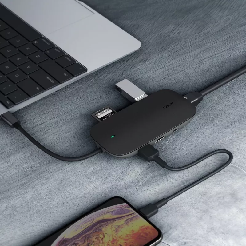 Dokavimo stotelė nešiojamam kompiuteriui AUKEY CB-C71 — 3x USB-C (USB 3.2 Gen1), HDMI, RJ-45, MicroSD, USB PD 100W, 0,15 m laidas, juoda