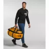 Krepšys The North Face Base Camp Duffel L 95 L poliesteris juoda, geltona