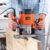 Frezeris/Trimeris Black & Decker KW1200EKA-QS – kompaktiškas frezeris su reguliuojamu gyliu, ergonomiškas dizainas