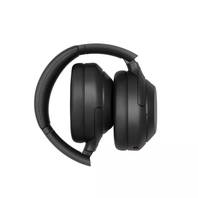 Sony WH-1000XM4 belaidės ausinės ant galvos, juodos