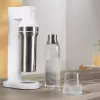 Sodos aparatas BRITA Carbonator 1046730 Baltas – kompaktiškas gazuoto vandens gamintojas su 2 buteliais (231×126×443 mm)