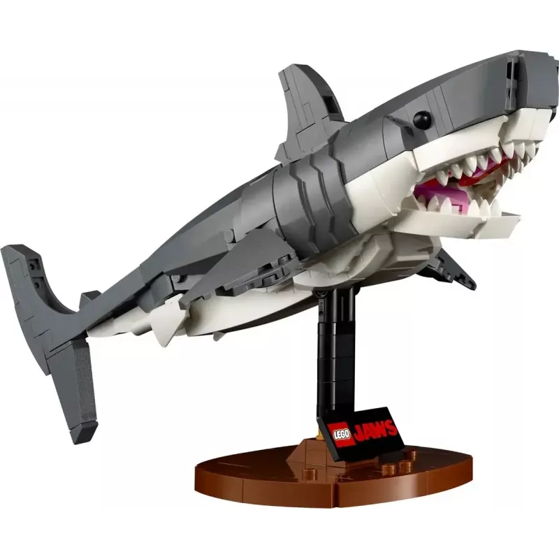 Statybinis žaislas LEGO Ideas 21350 Jaws rinkinys – 1497 dalių, 3 minifigūrėlės, valtis ir ikoniškas ryklys, rekomenduojamas amžius 18+