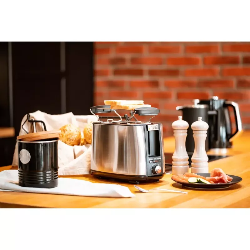 Skrudintuvas Adler AD 3214, 2 griežinėliams, nerūdijantis plienas, 900 W, 7 skrudinimo lygiai, atšildymas/pašildymas/automatinis išsijungimas