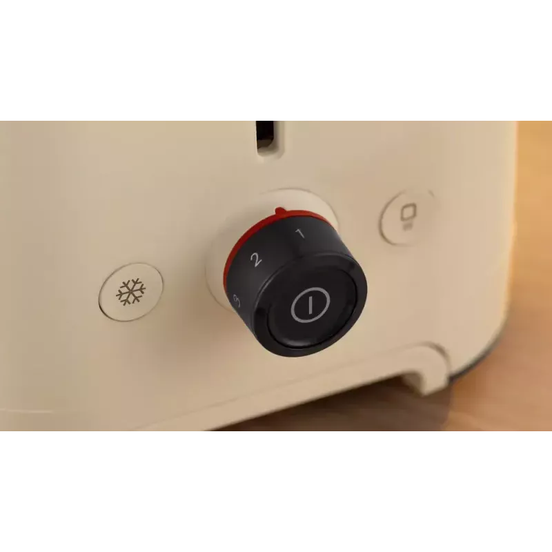 Skrudintuvas Bosch Compact TAT3M127 – 2 plyšiai, smėlio spalvos plastikinis korpusas, kompaktiškas dizainas