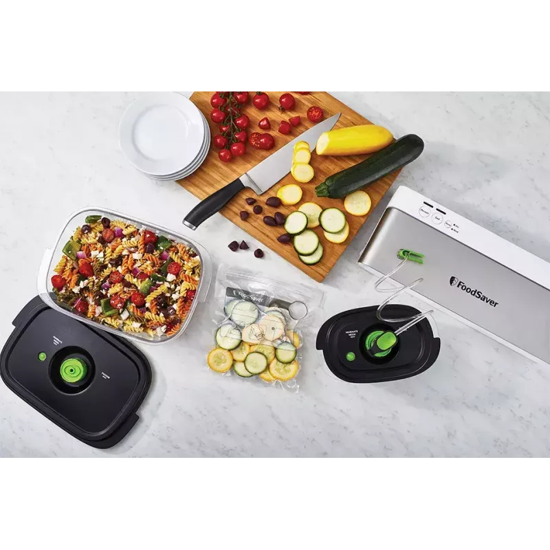 Vakuuminis pakuotuvas FoodSaver VS0100X – sukamasis valdymas, komplekte ritinys ir 4 maišeliai, sidabriškai baltas