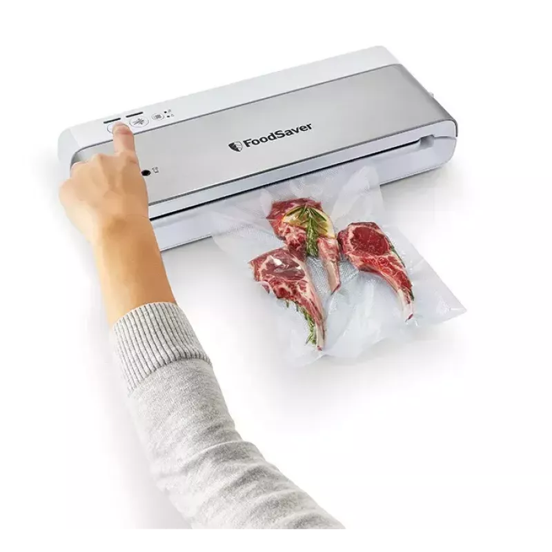 Vakuuminis pakuotuvas FoodSaver VS0100X – sukamasis valdymas, komplekte ritinys ir 4 maišeliai, sidabriškai baltas