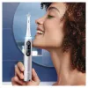 Elektrinis dantų šepetėlis Oral-B iO 9 suaugusiems, besisukantis, 2 rankenos, 2 šepetėlių galvutės, įmontuota baterija, 3 h įkrovimas, juoda/rožinė