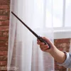 Wizarding World Harry Potter 12 colių burtų lazdelė su stovu ir liejiniu simboliu, Magiškos būtybės