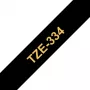 Juostelė etikečių Brother TZe334 12mm auksinė ant juodos