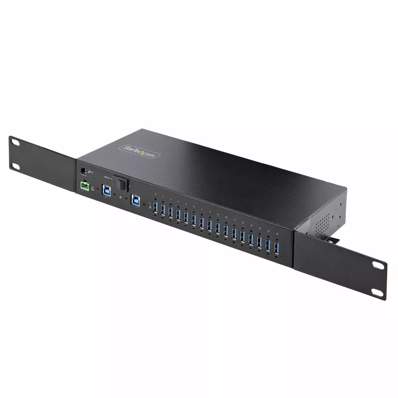 StarTech.com 16 prievadų pramoninis USB 5Gbps centras su maitinimo adapteriu, metaliniu korpusu, tvirtinimo galimybėmis, ESD apsauga, gnybtų bloko maitinimu, USB įkrovimu, dviejų pagrindinių kompiuterių perjungimu - TAA