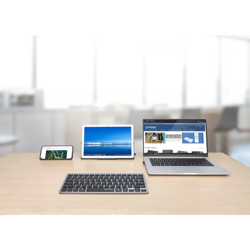 Manhattan Ultra Slim Dual-Mode belaidė klaviatūra, Vokietijos QWERTZ išdėstymas, Bluetooth (v3.0) ir belaidis ryšys (2,4 GHz), 78 žemo profilio žirkliniai klavišai, automatinis energijos valdymas, veikimo atstumas 10 m, USB-A mikro imtuvas, AAA baterija (