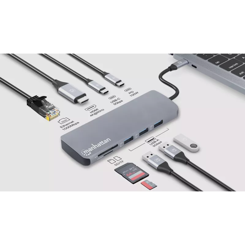 Manhattan USB-C Dock/Hub su kortelių skaitytuvu, 7 prievadai: Ethernet, HDMI, USB-A (x3) ir USB-C (x2), su Power Delivery (PD) 100W – reikalingas išorinis USB-C įkroviklis (neįtrauktas). Maitinamas per USB (nereikia išorinio maitinimo šaltinio), kai PD ne