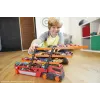Hot Wheels City Mega Hauler – didžiulis vilkikas su talpa iki 50 automobilių, 1:64 skalė, nuo 3 metų