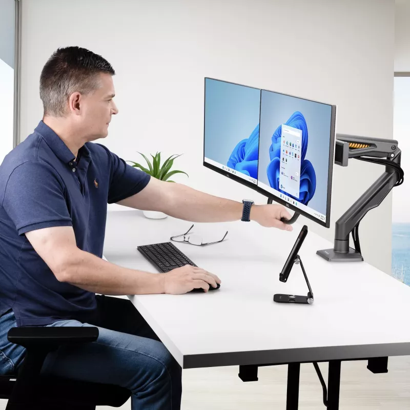 StarTech.com dviejų monitorių stalinis laikiklis su skersine, iki 27 colių ekranams, VESA 75x75/100x100, iki 15 kg, C formos spaustuvas, pilnai reguliuojamas, mechaninė spyruoklė, TAA