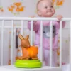 ANSMANN baby naktinė lemputė 1800-0059 — LED, geltona šviesa, baterijos AA ×3, 119×119×137 mm, ruda/žalia