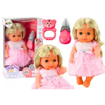 LEAN TOYS Lėlė šviesiai rožine suknele su šlapinimosi funkcija, buteliuku ir barškučiu