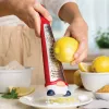 OTOTO Pepito Universal Grater - Tarkos šuo taksas, nerūdijantis plienas, juoda