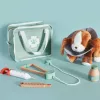 Janod Veterinarijos rinkinys - 10 dalių vaidmenų žaidimų rinkinys su mediniais instrumentais ir audinio dėklu