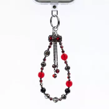 Crong Phone Charm Lanyard Red Bow – universalus apsauginis riešo dirželis išmaniesiems telefonams