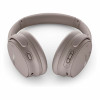 Bose QuietComfort triukšmą slopinančios ausinės ant ausų – smėlio spalvos