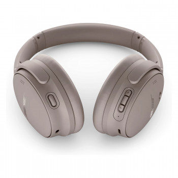Bose QuietComfort triukšmą slopinančios ausinės ant ausų – smėlio spalvos