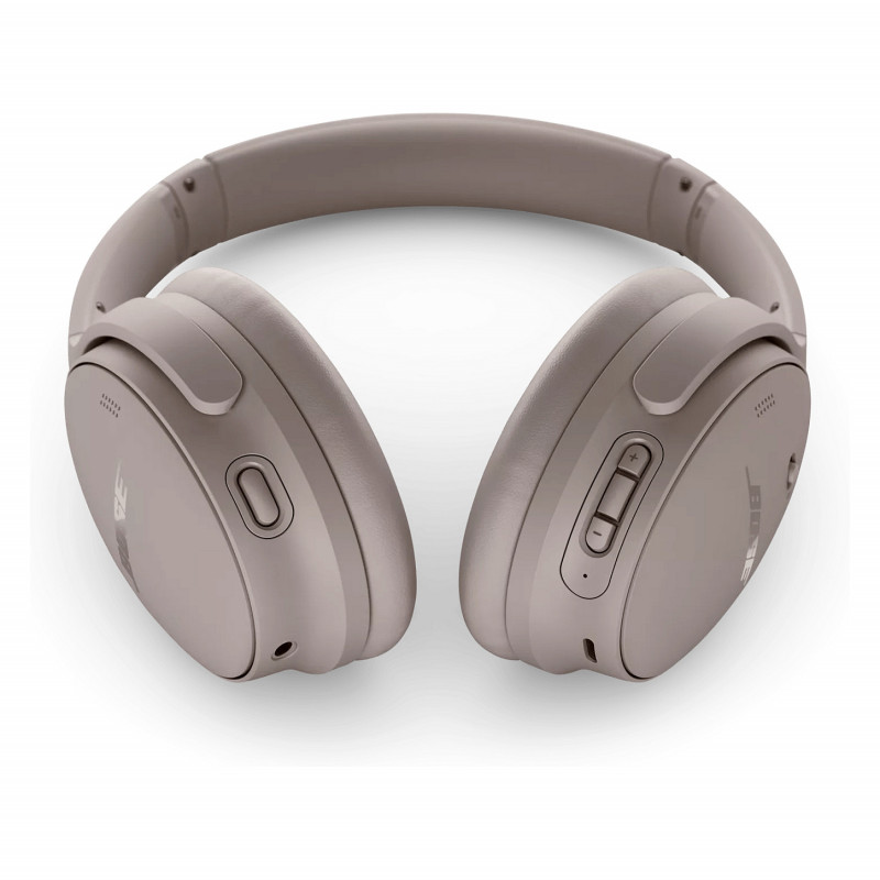 Bose QuietComfort triukšmą slopinančios ausinės ant ausų – smėlio spalvos