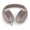 Bose QuietComfort triukšmą slopinančios ausinės ant ausų – smėlio spalvos