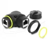 Delock RJ45 Movėja Cat.6 Moteriška į Moterišką su M23 x 1.5 mm Sriegiu ir Apsauginiu Dangteliu, 90° Kampu, IP68, Juoda