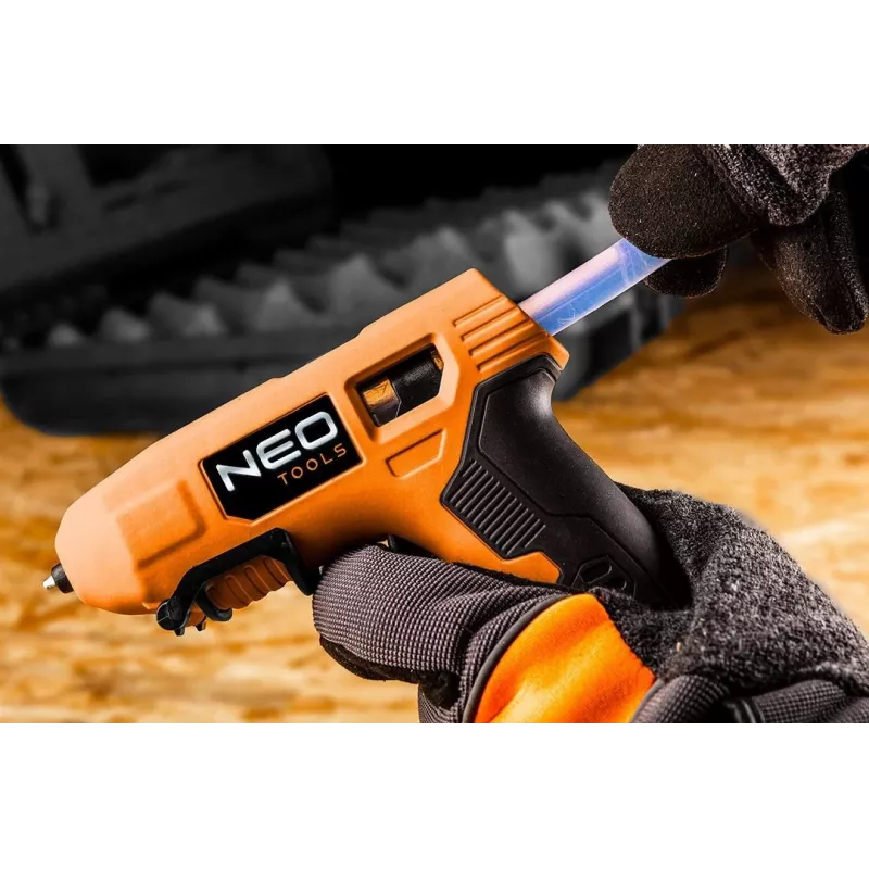 NEO Tools 17-083 20W karštų klijų pistoletas su apsauga nuo varvėjimo, 11 mm klijų lazdelėms, įmontuotas stovas, 230 V, oranžinis/juodas
