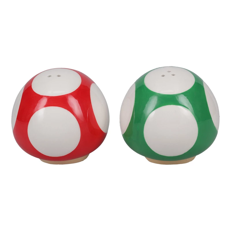 Paladone Super Mario Mushroom druskos ir pipirų indelių rinkinys (raudonas Super grybas ir žalias 1-Up grybas)