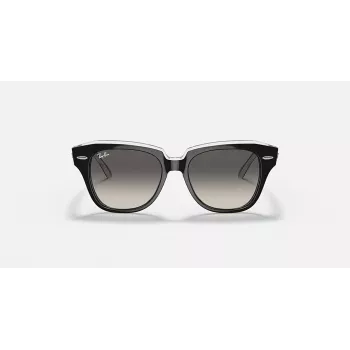 Ray-Ban RB9186S vaikiški akiniai nuo saulės 711611 skaidrūs mėlyni rėmeliai pilki gradientiniai lęšiai 46 mm