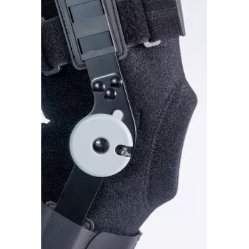 REH Stabilmax O-1243/4XL atviras ilgas kelio įtvaras su reguliuojamais dirželiais, juodas, 4XL
