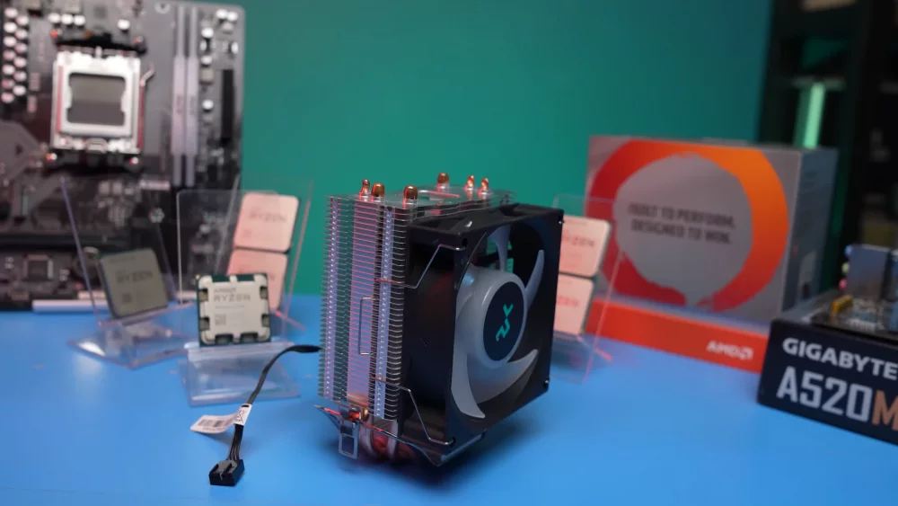 Tower CPU cooler next to a motherboard